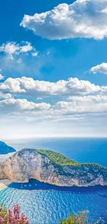 Breathtaking view of ocean and cliffs with clear blue sky.