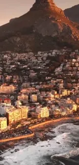 Sunset view over a coastal city with mountains and ocean.