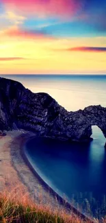 Coastal sunset with vibrant skies and tranquil blue sea.