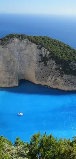 A stunning coastal view with azure blue waters and lush green cliffs.