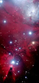 Mobile wallpaper of a cosmic nebula with vibrant red hues and scattered stars.