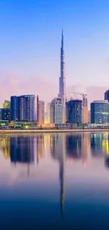 Vibrant Dubai skyline with waterfront reflections.