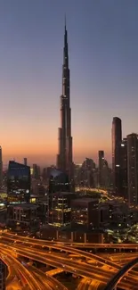 Dubai skyline with Burj Khalifa at sunset, showcasing city lights and highways.