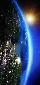 View of Earth from space with glowing sun and starry background.