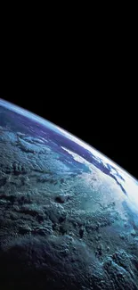 View of Earth from space with vibrant blue and green hues.