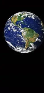 Vibrant image of Earth in space with black background.