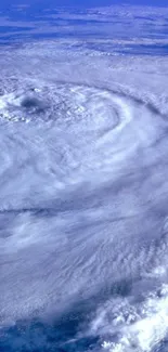 A stunning aerial view of swirling clouds and atmospheric vortex.