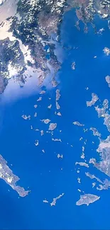 Satellite capturing Earth's blue oceans and continents from space.