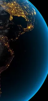 Vibrant Earth image from space with glowing city lights.
