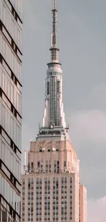 Empire State Building with a modern city backdrop.