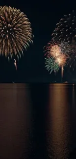 Vibrant fireworks display over water at night with reflections.