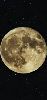 Golden full moon against starry night sky.