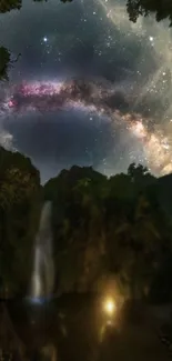 Night sky with galaxy over a forest and waterfall landscape.