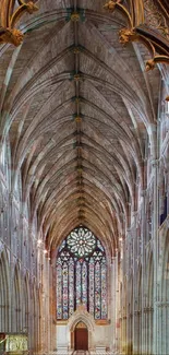 Intricate Worcester Cathedral Gothic archway and pillars in rich brown tones.