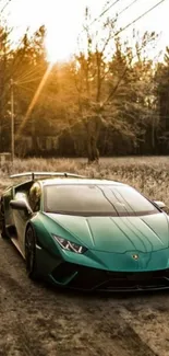 Green sports car on scenic road at sunset.