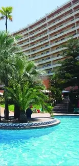 Hotel pool with palm trees and clear blue sky backdrop.