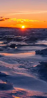 Sunrise over a frozen, icy landscape with vibrant colors.