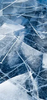 Close-up of shattered ice with a blue hue, creating a stunning textured pattern.