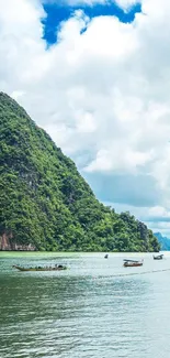 Breathtaking island with limestone cliff and green waters under a blue sky.