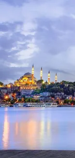 Stunning nighttime view of Istanbul skyline with illuminated mosque.