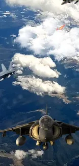 Dynamic wallpaper featuring fighter jets soaring above the clouds in deep blue skies.