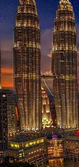 Petronas Towers lit up at night in Kuala Lumpur
