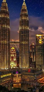 Kuala Lumpur night skyline with twin towers and starry sky.