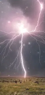 Dramatic lightning strikes across dark stormy sky.