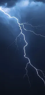 Dramatic lightning bolt in dark stormy sky.