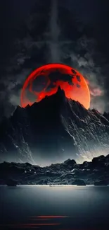 Red moon over mountain in dark sky.