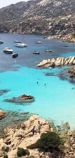 Mediterranean coast with turquoise waters and yachts.