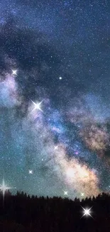 A stunning view of the Milky Way galaxy over a dark rural landscape at night.