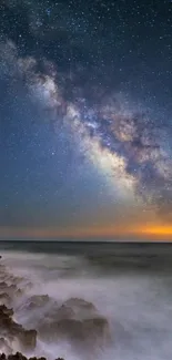 Milky Way galaxy over ocean night scene wallpaper.