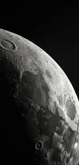 Close-up view of the moon's surface against a dark background.