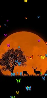 Orange moon with deer and tree silhouettes against a dark sky.