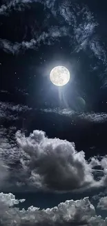 Moonlit night sky with clouds and stars.