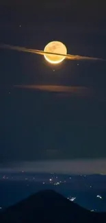 A glowing moon over a serene night mountain landscape.