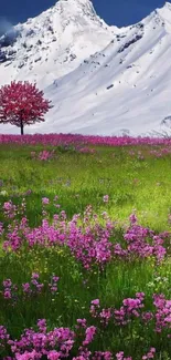 Snowy mountains with pink flowers in a scenic landscape wallpaper.