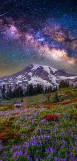 Mountain landscape with starry galaxy sky and colorful meadow flowers.