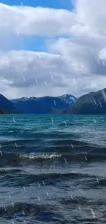 Beautiful lake with mountains and rain effect under a cloudy sky.