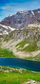 Mountain lake surrounded by rocky terrain and greenery.