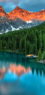 Stunning sunset over a serene mountain lake with lush forest.