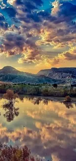 Beautiful mountain landscape with sunset reflection on water.