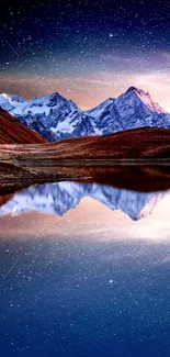 Snow-capped mountains reflected in a tranquil lake under a starry night.