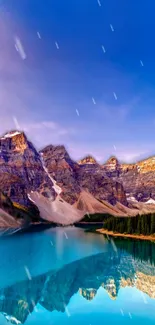 Majestic mountains reflecting on a clear lake under a vibrant blue sky.