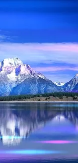 Majestic mountains reflecting in a tranquil lake under a vibrant blue sky.