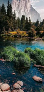 Scenic mountain view with a calm river and lush greenery.