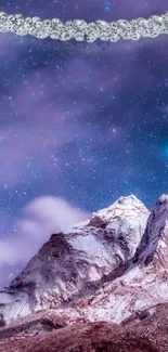 Majestic mountain under starlit night sky wallpaper.