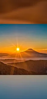 Beautiful orange sunrise over a mountain range with vibrant colors.