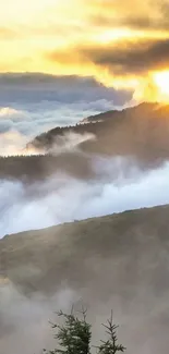 Breathtaking mountain sunrise with clouds and golden light.